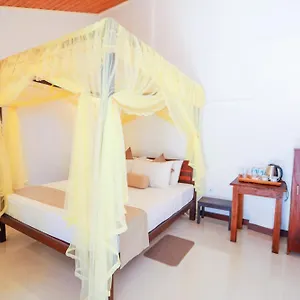 https://mels-inn.kandyhotelsnow.com